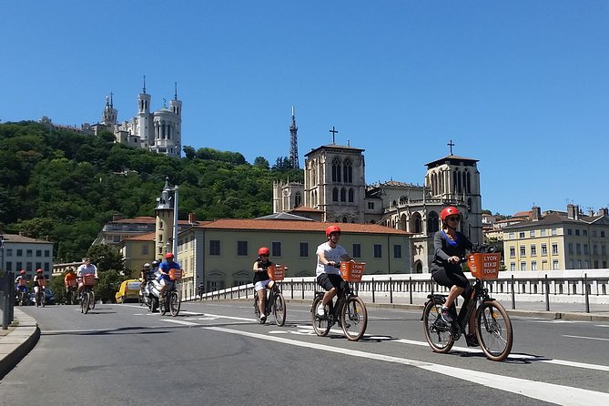 4h Complete Lyon Experience: E-Bike, Food Tasting & Old Town Walk - Cruising the Rhône for Thirty Minutes
