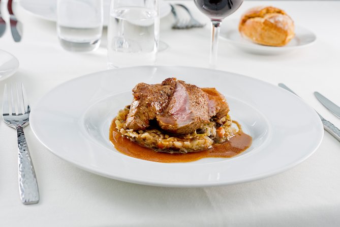 Bateaux Parisiens Seine River Gourmet Dinner & Sightseeing Cruise - Dinner with live music and changing views