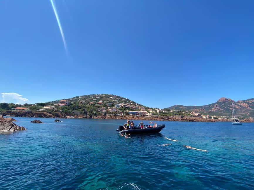 Cannes: Scenic Coves RIB Boat Tour - The black tender and its 12-seat setup
