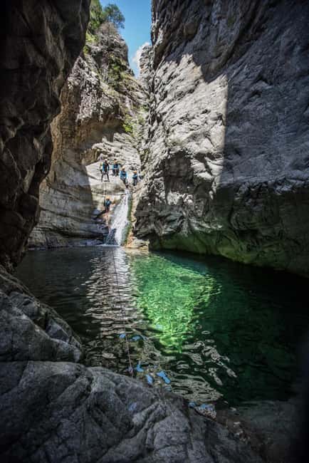 Corsica Richiusa Sporty Canyon Tour - Abseiling beneath a waterfall
