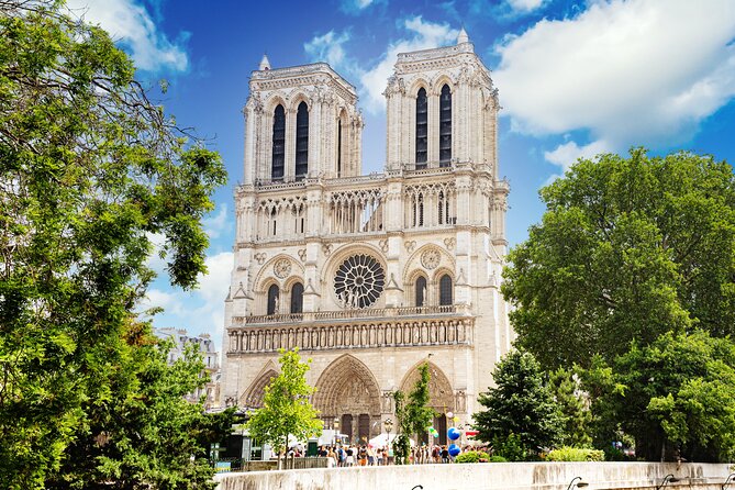 Early Access Paris Notre Dame Cathedral Walking Tour - Walking beside the Seine