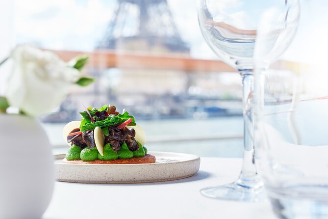 Early evening Dinner Cruise with drinks by Bateaux Parisiens - Musée d’Orsay, the Latin Quarter, and Pont Neuf