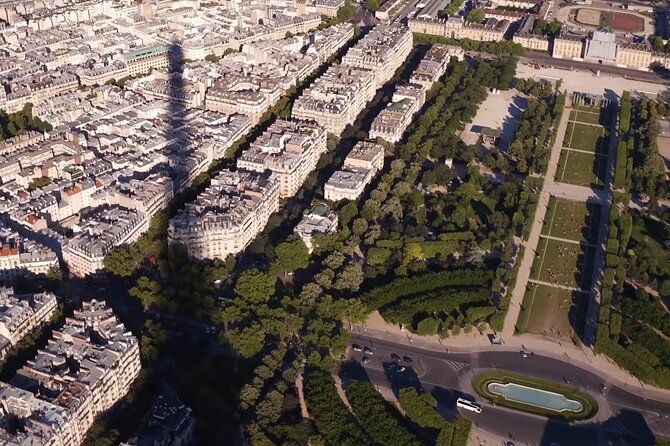 Eiffel Tower Climbing Tour with Summit Access - Guides add the human side of the monument