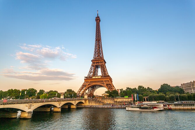 Eiffel Tower Guided Climbing Experience & Optional Summit Upgrade - Climbing from the ground to the first platform