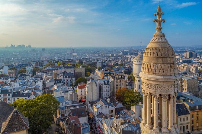 ESSENTIAL MONTMARTRE Walking Tour: the essential highlights+MORE! - A man through a wall, a famous black cat, and Dalida