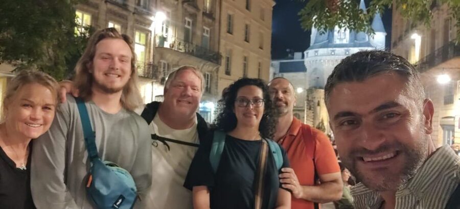 Exclusive! Bordeaux: Nighttime Highlights Walking Tour - Old squares, medieval gates, and Bordeaux’s changing story