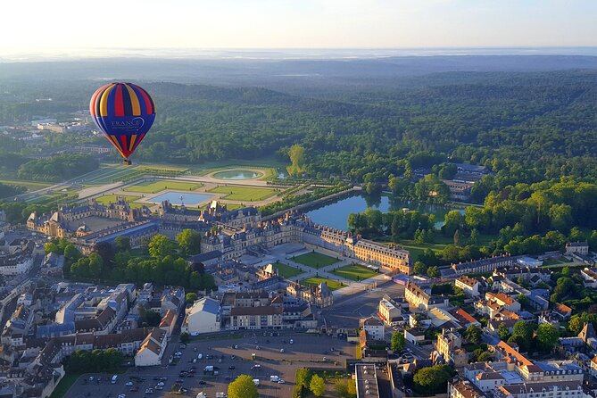 Fontainebleau Forest Half Day Hot-Air Balloon Ride with Chateau de Fontainebleau - Watching the balloon rise at Carrefour de Maintenon
