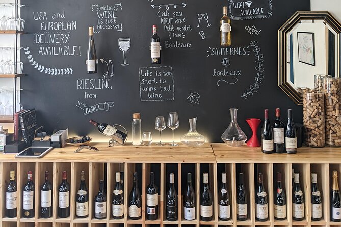 French Wine, Champagne And Cheese Tasting Paris SECRET WINE DOOR - Buying a bottle after the tasting