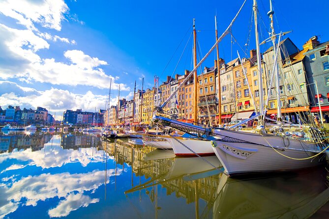 From Le Havre Breathtaking Honfleur and Deauville Shore Excursion - Deauville: Beachfront Style and the Famous Boardwalk