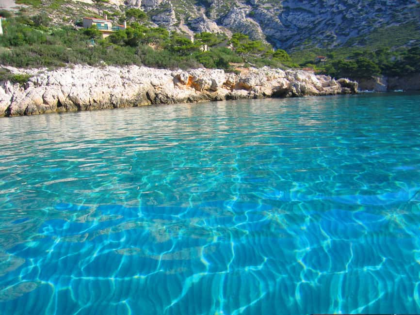 From Marseille: Iconic Calanques Boat Tour with Swimming - How weather changes the experience