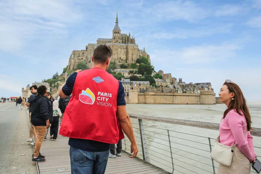 From Paris: Mont Saint-Michel Tour with Hotel Pickup Service - First sight of the fortified island