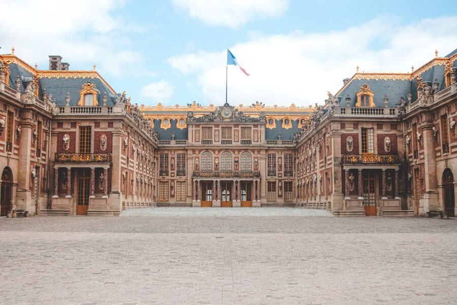 From Paris: Versailles Palace and Gardens Guided Experience - Meeting at Invalides and taking the train