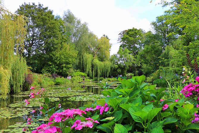 Giverny and Monet's Garden Half-Day Trip from Paris - Walking through the Clos Normand