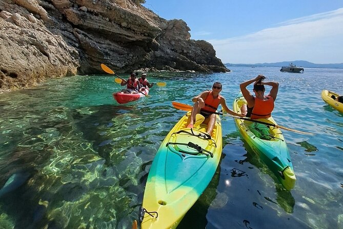 Guided kayak excursion in creeks - Rocky coves and a clear-water swimming stop