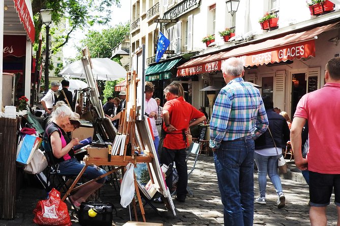Guided Tour of Sacré-Coeur and Montmartre - Walking through the streets below the dome