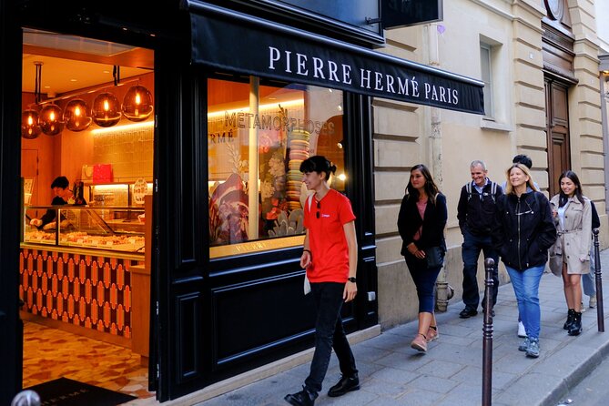 Hidden Paris: Explore Medieval Marais on a Walking Tour - Place des Vosges, the elegant centerpiece