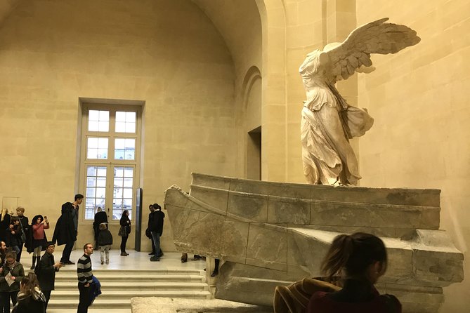 Louvre Museum Masterpieces Guided Tour - Crowds, communication, and physical demands
