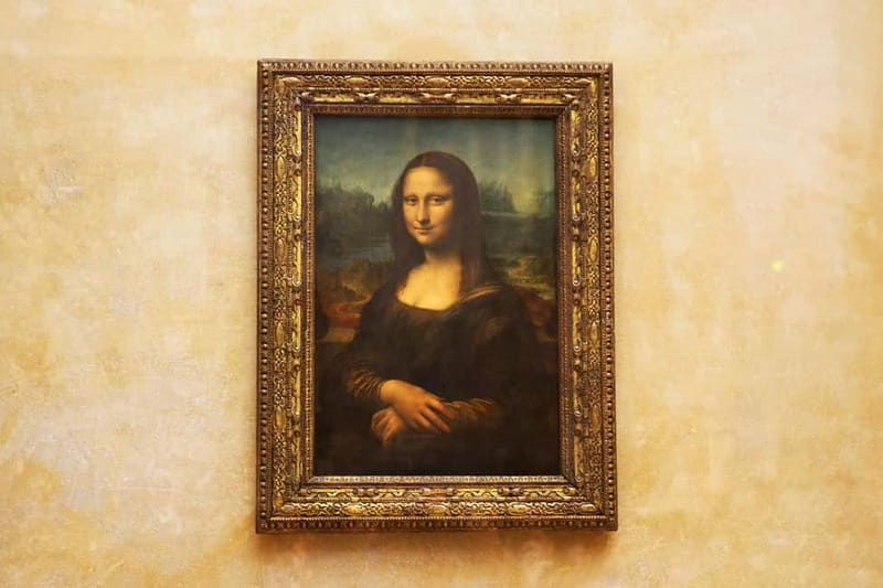 Louvre Museum: Mona Lisa Without the Crowds Last Entry Tour - Meeting the guide at the Arc de Triomphe du Carrousel