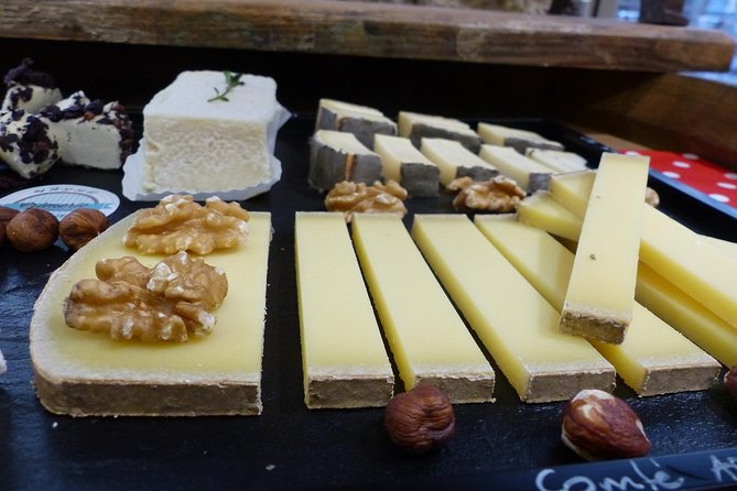 Lyon Old Town Food Tour with Local Specialties Tasting & Lunch - Charcuterie, local wine, and the Lyonnais table