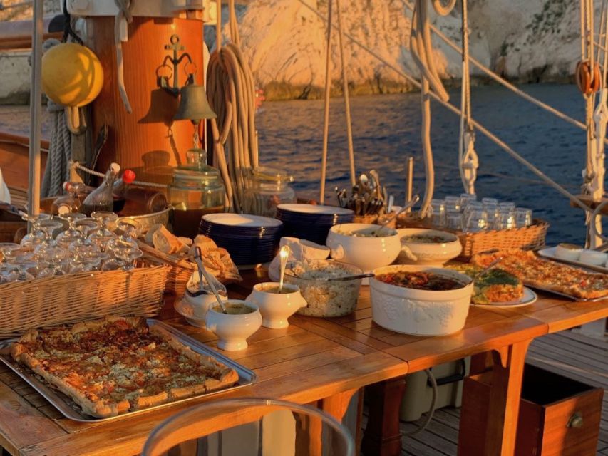 Marseille: Frioul Islands Sunset Cruise with Cocktail Dinner - Dinner on deck with organic wine