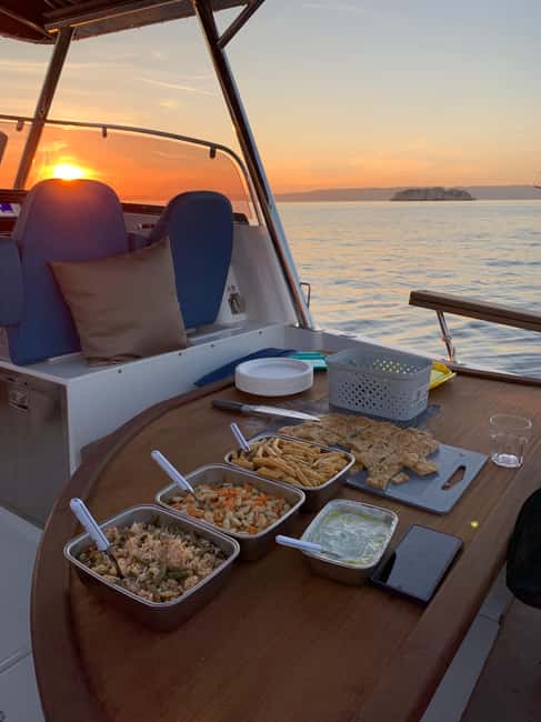 Marseille: Sunset Boat Cruise with Dinner and Drinks - Leaving Marseille’s Old Port around sunset