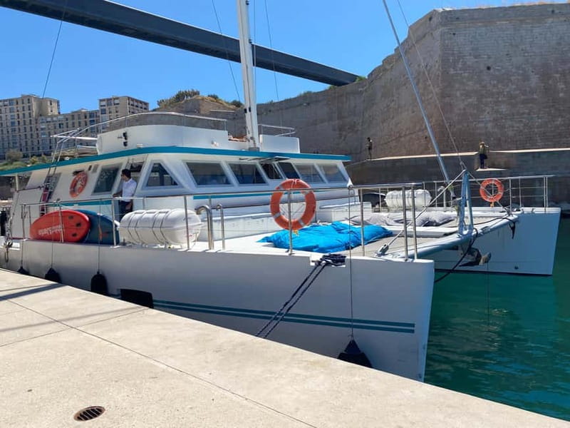 Marseille: Sunset catamaran cruise, buffet & drinks - Leaving from the Mucem for an evening at sea