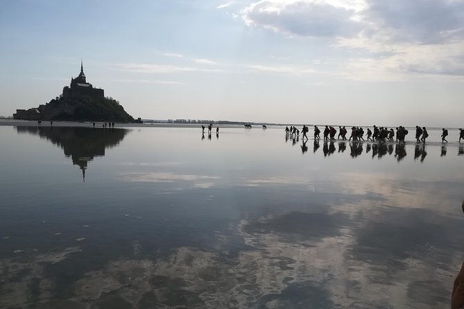 Mont-Saint-Michel bay walk - Meeting beneath the towers and reading the tide