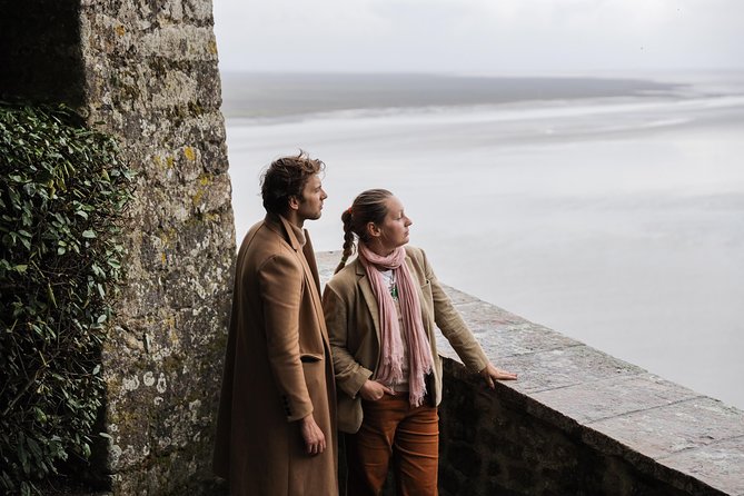 Mont Saint Michel Guided Day Trip with Abbey Entry from Paris - Walking the fortifications above the village