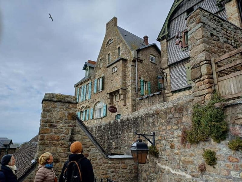Mont Saint Michel: Village History and Legends Walking Tour - The bridge, the tide, and the first sense of place