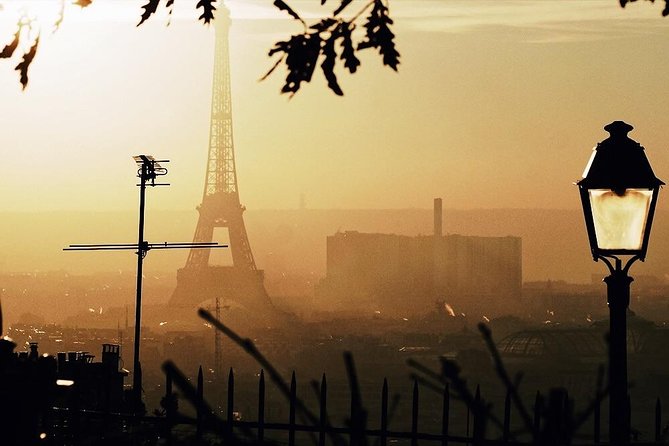 Montmartre District and Sacre Coeur - Exclusive Guided Walking Tour - Van Gogh, Rue Lepic, and the climb uphill