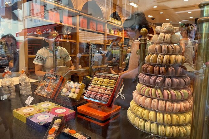Montmartre Hill French Gourmet Food and Wine Tasting Walking Tour - Windmills, cafés, and the final climb