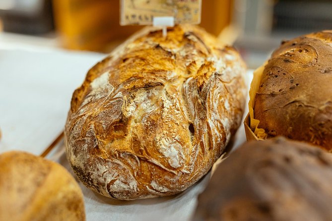 Montmartre Private Food Walking Tour With Locals: The 10 Tastings - Starting near the Moulin Rouge