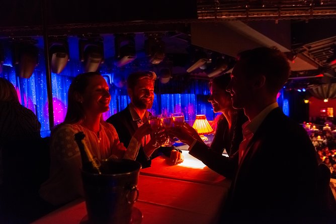 Moulin Rouge Dinner Show with Champagne and Drop Off - Who will enjoy this Paris cabaret night