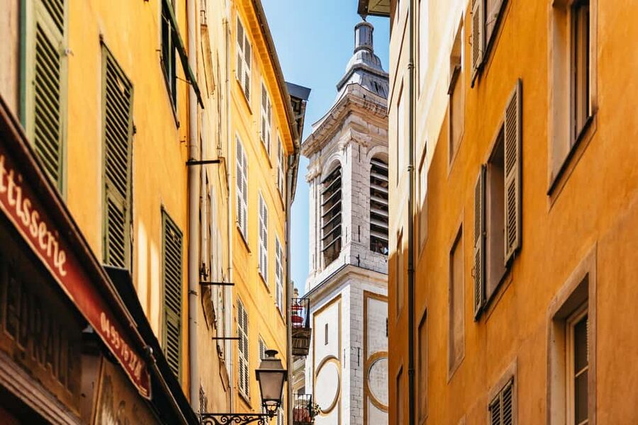 Nice: Old Town & Castle Hill Informative Guided Walking Tour - Place Massena and the red facades