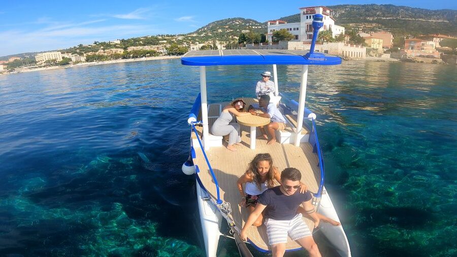 Nice: Private French Riviera Solar Boat Cruise - Getting a turn at the controls