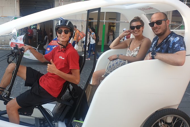 Nice: Visit of Nice by electrically assisted bike taxi 1 hour. - Starting at Place Massena With the Seven Continents