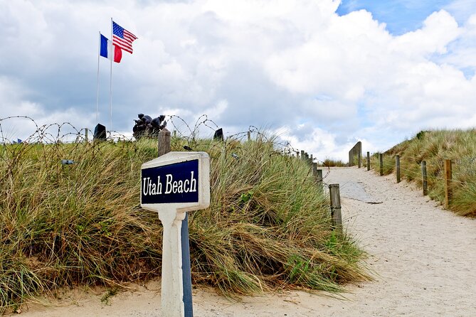 Normandy D-Day Sites & Cemetery Day Trip from Paris with Lunch - Pointe du Hoc: craters, cliffs, and a hard walk
