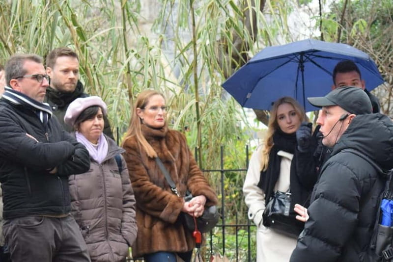 Notre-Dame Cathedral Exterior & Latin Quarter Guided Tour - A historic street toward the Seine