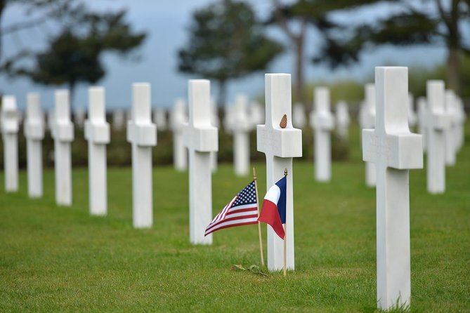 Omaha Beach D-Day Experience - Afternoon group tour from Bayeux - Pointe du Hoc: craters, cliffs, and German bunkers
