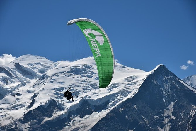 Paragliding Tandem Flight over the Alps in Chamonix - Having a turn at the controls