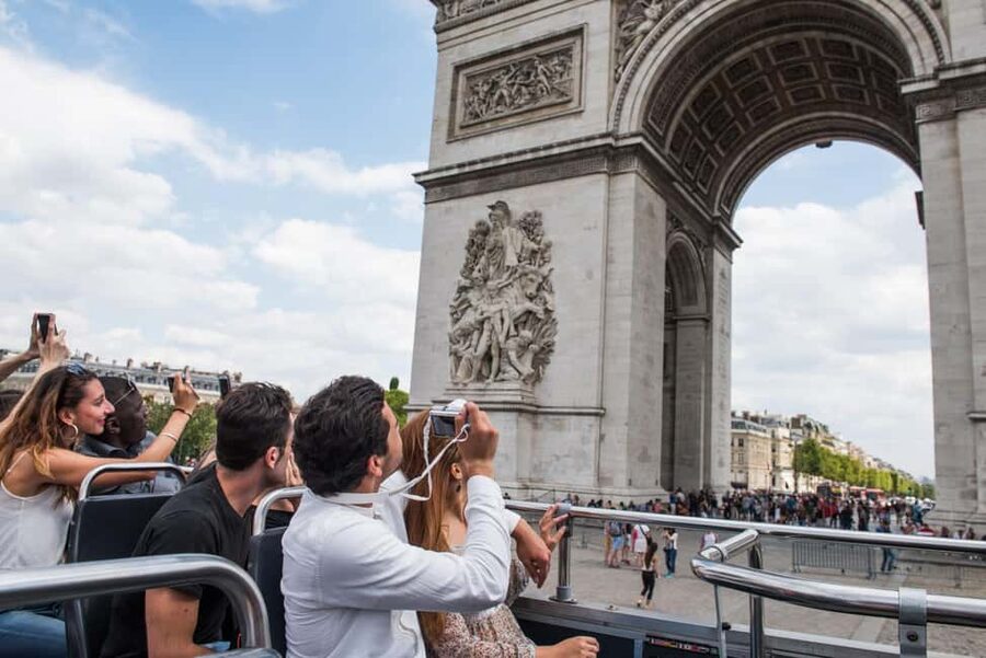 Paris: Arc de Triomphe Ticket & Big Bus Hop-on Hop-off Tour - Starting the red bus route around central Paris