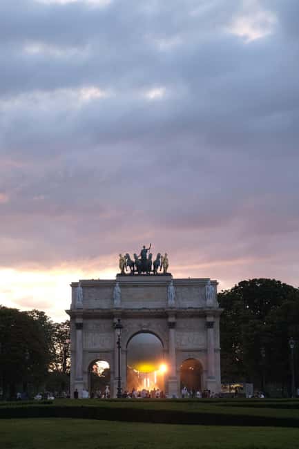 Paris By Night: 3-Hour Guided Bike Tour - The Louvre lit up at night