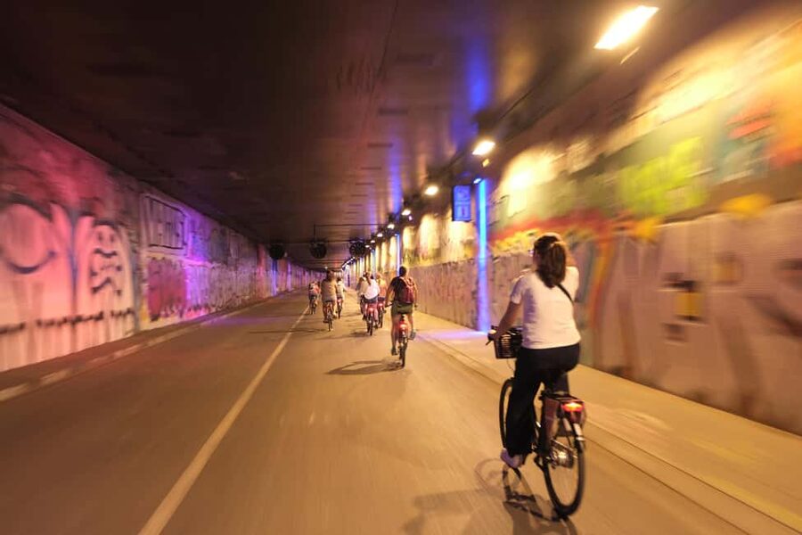 Paris By Night: 3-Hour Guided Bike Tour - Notre-Dame and the riverfront atmosphere