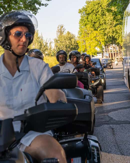 Paris: City Highlights Guided Quad Tour - The Arc de Triomphe and its dramatic traffic circle