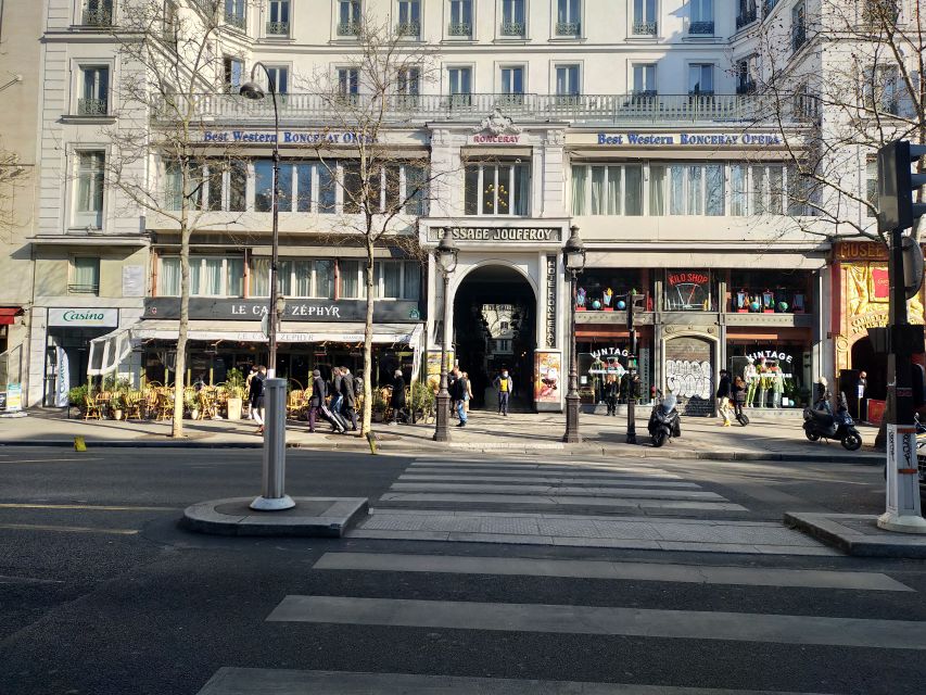 Paris: Covered Passages Walking Tour - Passage Choiseul: sunlight, length, and tiled floors