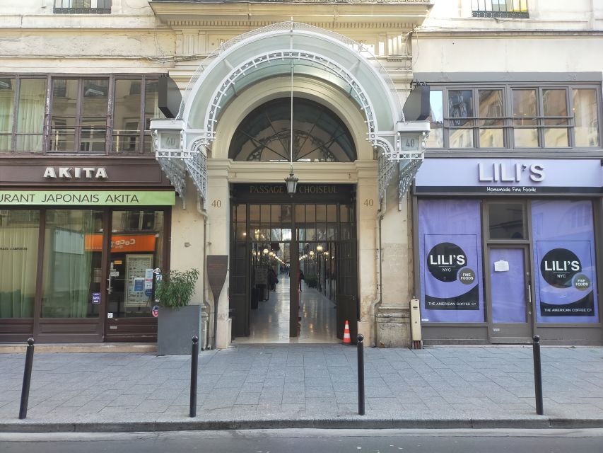 Paris: Covered Passages Walking Tour - Passage Jouffroy: glass, iron, and a wax museum