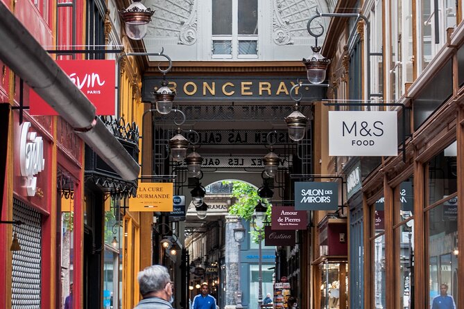 Paris Covered Passages Walking Tour plus Seine Cruise Option - Passage Choiseul: a long glass-roofed street