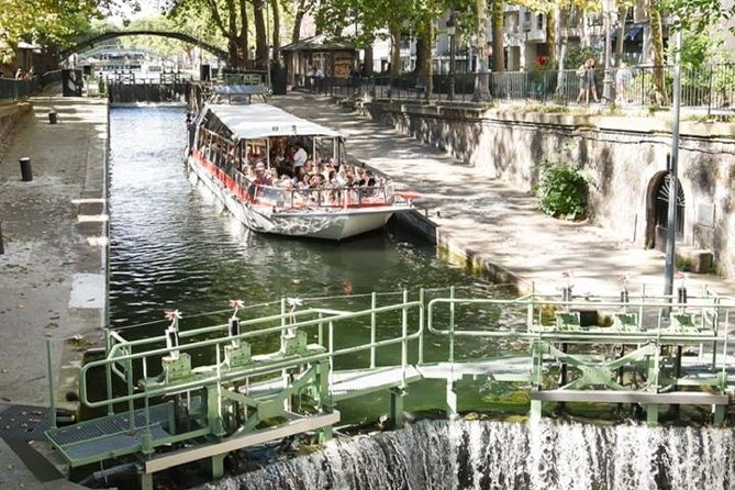 Paris: Cruise on The Canal Saint Martin and The Seine River - Notre-Dame, the Louvre, and the Orsay Museum from the water