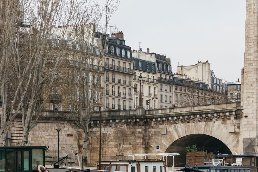Paris: Cruise on the Saint-Martin Canal and the Seine River - Pedestrian bridges, chestnut trees, and canal-side Paris