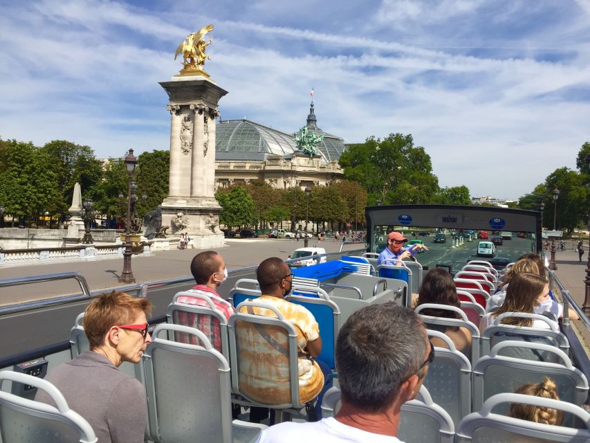 Paris: Discovery Hop-On Hop-Off and Paris by Night Tour - The audio guide: useful orientation, not a history course